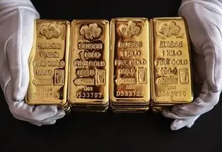 کاهش قیمت هر اونس طلا در معاملات روز پنجشنبه