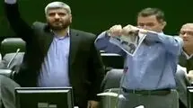 نماینده تهران تصاویر سران اروپایی را به سطل آشغال ریخت