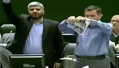 نماینده تهران تصاویر سران اروپایی را به سطل آشغال ریخت