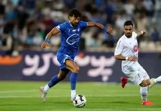 ببینید واکنش عجیب رامین رضاییان به مصاحبه در فرودگاه