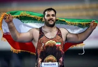 قهرمان پرتاب وزنه آسیا: از حضور مربی لتونی در تیم ملی بی‌خبرم
