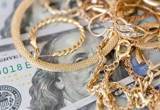 کاهش ۲۲ دلاری قیمت هر اونس طلا در بازارهای جهانی