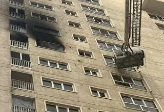 آتش‌سوزی مهیب در یک مجتمع مسکونی در دهکده المپیک +جزئیات