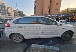شعار نویسی روی یک ماشین چینی علیه مذاکرات  + عکس 