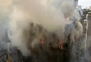 جزئیات جدید از مرگ ۲ کارگر در حادثه آتش‌سوزی خیابان ظهیرالاسلام تهران