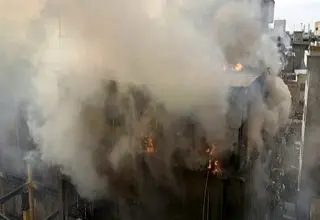 جزئیات جدید از مرگ ۲ کارگر در حادثه آتش‌سوزی خیابان ظهیرالاسلام تهران