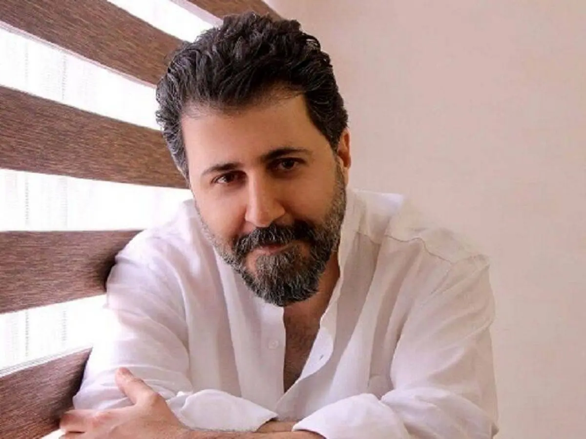 ژست پدر پسری هومن حاجی‌عبداللهی با پسرش 