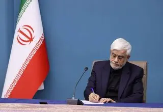 تبریک عارف به تیم ملی کشتی آزاد ایران