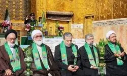 برگزاری آیین سنتی تعویض پرچم گنبد بارگاه امام رضا (ع) با حضور عراقچی 