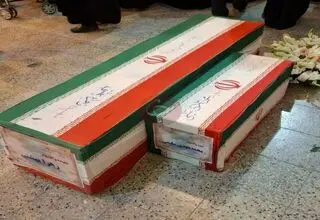 تصویر دردناک از تابوت یک مادر و فرزند + عکس 