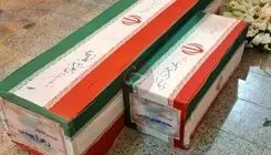 تصویر دردناک از تابوت یک مادر و فرزند + عکس 