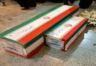 تصویر دردناک از تابوت یک مادر و فرزند + عکس 