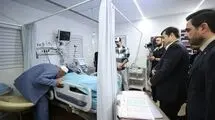 وزیر ورزش از کاظمی عیادت کرد/ بوسه پدر بر دست صابر