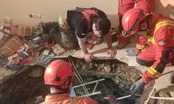 فروکش کردن کف ساختمان در میدان بهارستان/ چهار نفر زنده از گودال خارج شدند + عکس 